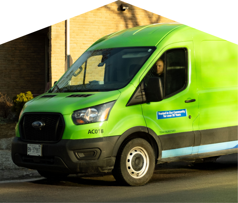 Furnasman service van parked by a brick home highlighting trusted plumbing, heating & electrical expertise since 1939. Furnasman service van parked by a brick home highlighting trusted plumbing, heating & electrical expertise since 1939.