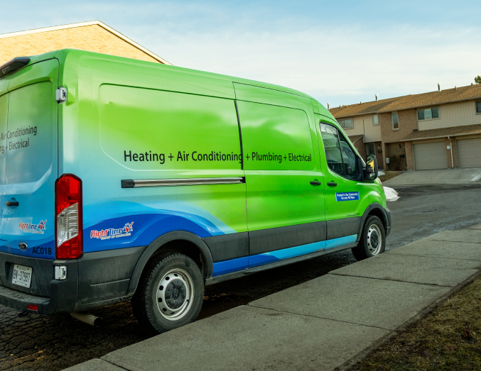 Furnasman service van with HVAC, plumbing, and electrical branding parked in a suburban neighborhood, promoting local trust. Furnasman service van with HVAC, plumbing, and electrical branding parked in a suburban neighborhood, promoting local trust.